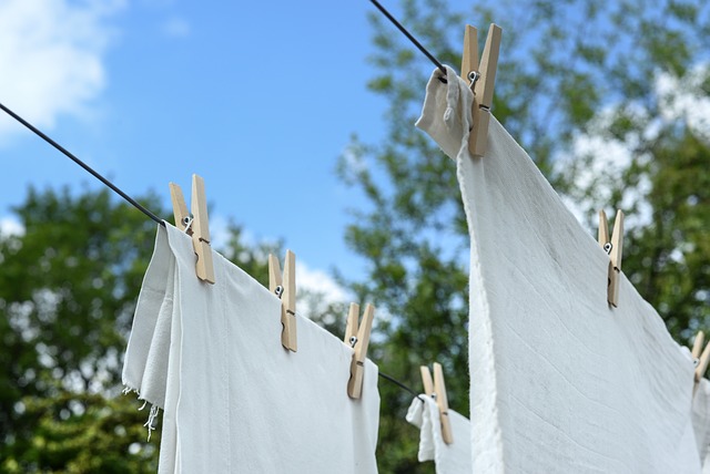 linen washed clean of past hanging on clothesline